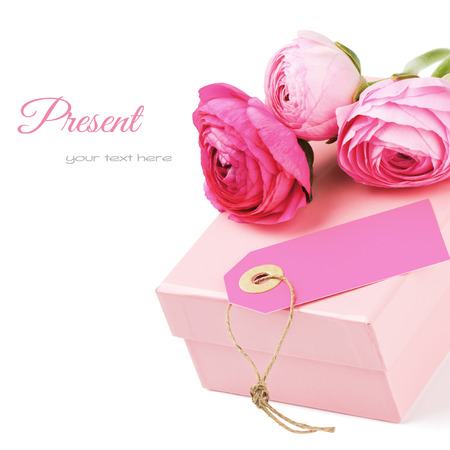 Gift box with pink peonies isolated over whiteの写真素材