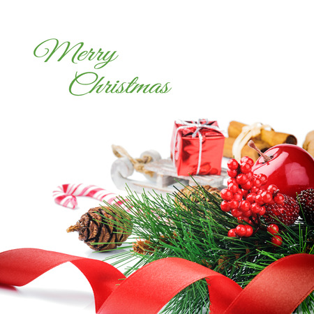 Setting with Christmas tree branch and festive decorationsの写真素材
