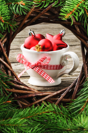 Red Christmas ornaments in festive settingの写真素材