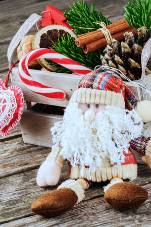 Christmas setting with Santa and festive ornamentsの写真素材