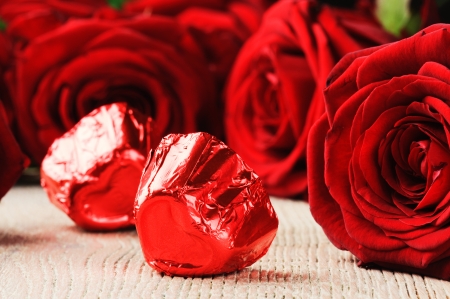 Chocolate hearts and red roses. St. Valentine conceptの写真素材