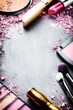 Frame with various makeup products in pink tone Frame with various makeup products in pink tone