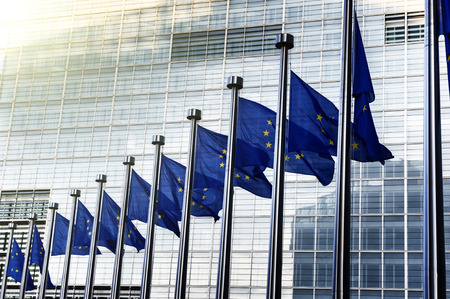 EU flags in front of European Commission in Brussels, Belgium