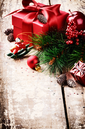 Christmas gifts in red tone in vintage festive settingの写真素材