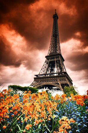 Summer in Paris. Eiffel tower with abstract red skyの写真素材