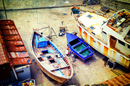 Fishing boats at dry dock. Camara de Lobos, Madeira islandの写真素材