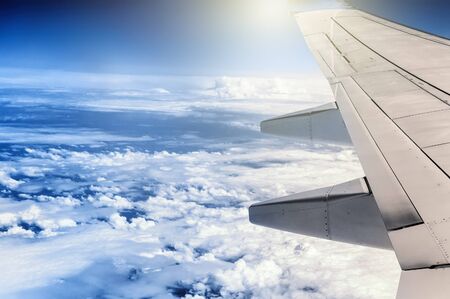 View of airplane wing through the window. Travel conceptの写真素材
