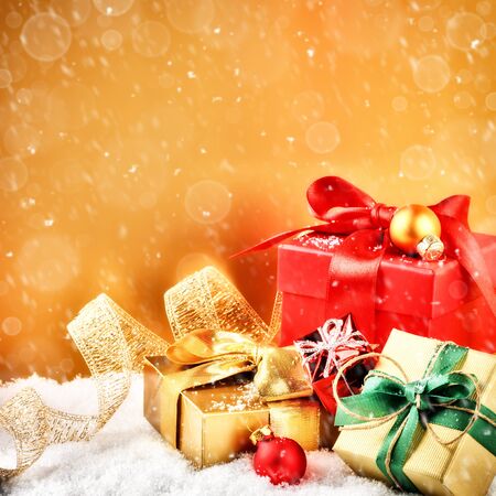 Christmas ornaments and gifts in golden and red tone. Copyspaceの写真素材