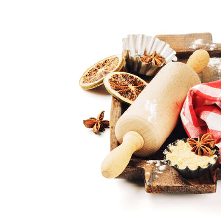 Christmas holiday baking setting with rolling pin and spices. Isolated over whiteの写真素材
