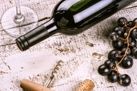 Setting with bottle of red wine, grape and corks. Wine list conceptの写真素材