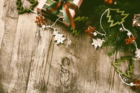 Christmas decorations in vintage style over old wood background. Christmas border with copy spaceの写真素材