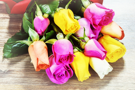 Bouquet of multicolor roses, closeup. St Valentine's greeting card conceptの写真素材