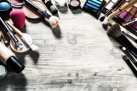 Colorful frame with various makeup products. Beauty background with copy spaceの写真素材