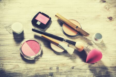 Makeup set with various cosmetic products and brushes. Beauty background with copy spaceの写真素材