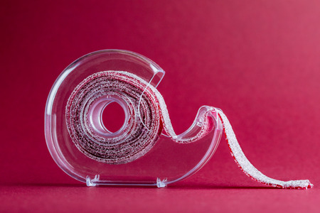 Blackcurrant Sugar Candy Ribbon in tape Holderの写真素材