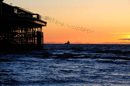 Sunset on the Irish Sea, at Blackpool, Englandの写真素材