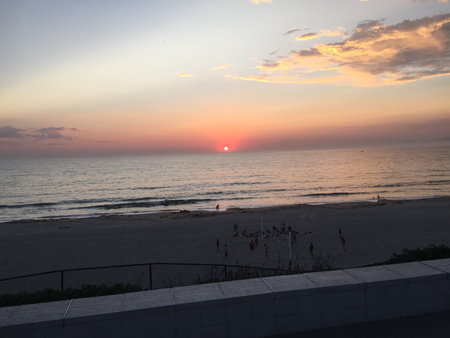 Sunset Tranquility at the Beach, Capturing the Beauty of the Ocean Landscape During the Evening Hoursの写真素材