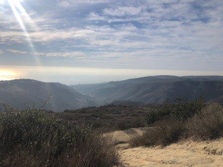 Sunset in the mountains on a sunny dayの写真素材