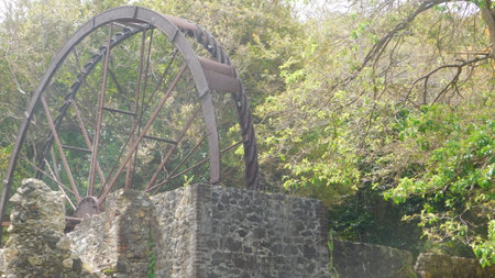 Old water wheel in Tobagoの写真素材