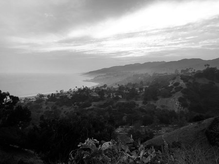 Black and white photo of the sea view from the mountain at sunset Pacific Palisades CAの写真素材