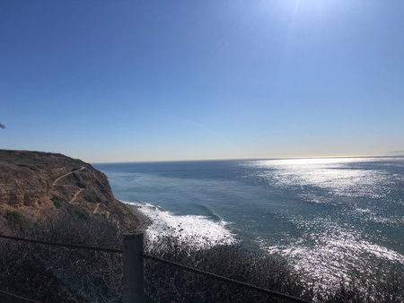 Coastal Cliffs Provide Stunning Views of the Pacific Ocean Under a Bright Blue Skyの写真素材