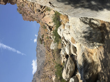 Stunning Desert Landscape With Rocky Terrain Beneath a Bright Blue Sky in California's Natural Beautyの写真素材