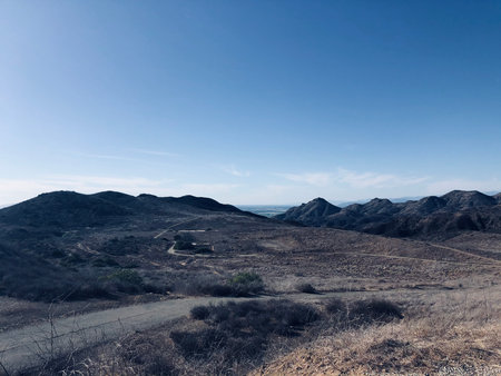 Breathtaking Views Over Rolling Hills and Distant Valleys on a Sunny Day in Southern Californiaの写真素材