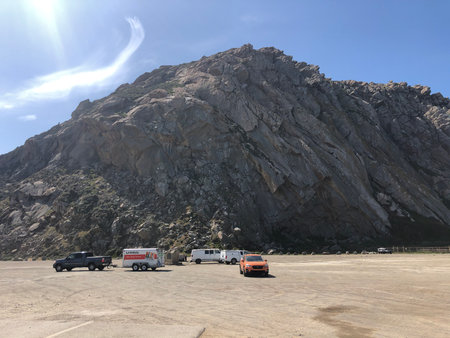 Scenic View of Rocky Terrain in a Vast Parking Area Under a Clear Blue Skyの写真素材