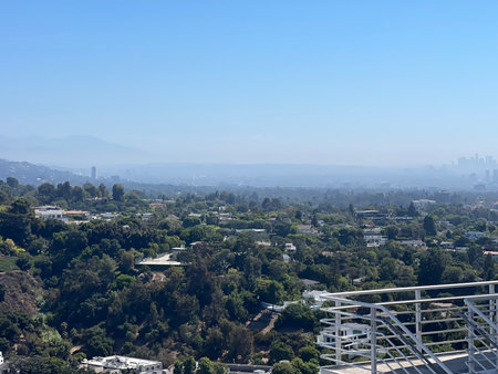 Vast Urban Landscape Viewed From a Scenic Overlook on a Bright Clear Dayの写真素材