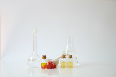  laboratory experiment and research with leaf, oil and ingredient  extract for natural beauty  and organic skincare product package,bio science concept. alternative medicine. spaの写真素材