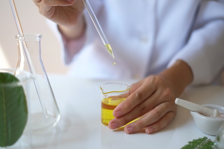 the scientist,dermatologist testing the organic natural product and alternative medicine.research and development beauty skincare.expert and professional prove.blank package,bottle,container .の写真素材