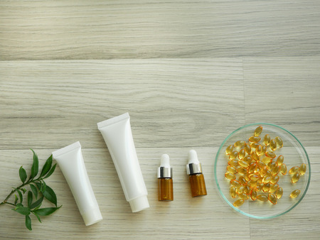 natural cosmetic skincare serum packaging with leaf, home made oil and beauty vitamin ingredient.organic product research the blank bottle container ,bio science . alternative medicine. spa.の写真素材