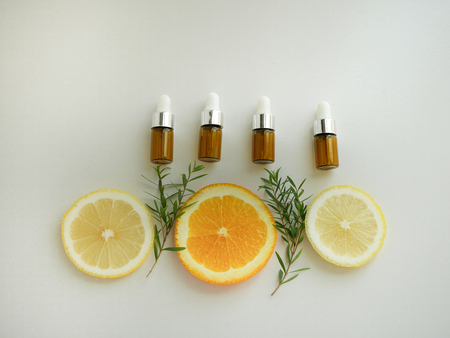 natural cosmetic skincare serum packaging with leaf, home made oil and beauty vitamin ingredient.organic product research the blank bottle container ,bio science . alternative medicine. spa.の写真素材