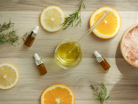 natural cosmetic skincare serum packaging with leaf, home made oil and beauty vitamin ingredient.organic product research the blank bottle container ,bio science . alternative medicine. spa.の写真素材