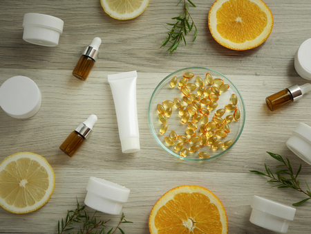 natural cosmetic skincare serum packaging with leaf, home made oil and beauty vitamin ingredient.organic product research the blank bottle container ,bio science . alternative medicine. spa.の写真素材