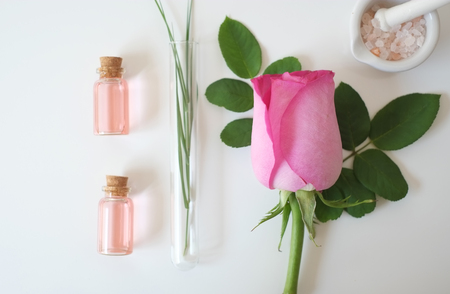 laboratory experiment and research with leaf, oil and ingredient  extract for natural beauty and organic skincare product the blank bottle for label ,bio science concept. alternative medicine. spa.の写真素材