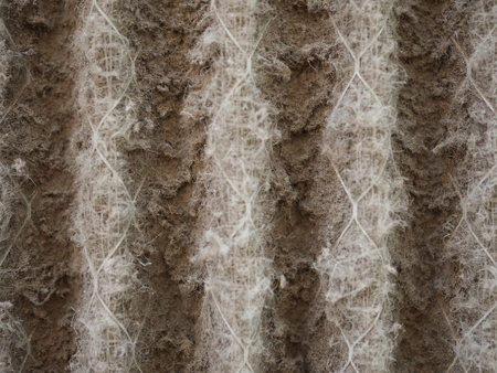 home air filter close up macro zoom show the dirt and particle cause bacteria inflection and sickness.の写真素材