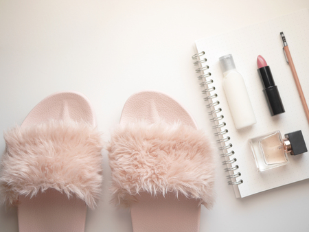 Flat lay woman accessories  white background with cosmetic ,notebook, pen and mobile phone. isolated.の写真素材