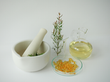 natural cosmetic skincare serum packaging with leaf, home made oil and beauty vitamin ingredient.organic product research the blank bottle container ,bio science . alternative medicine. spa.の写真素材