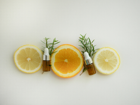 natural cosmetic skincare serum packaging with leaf, home made oil and beauty vitamin ingredient.organic product research the blank bottle container ,bio science . alternative medicine. spa.の写真素材