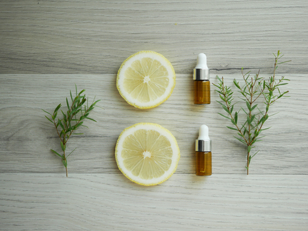 natural cosmetic skincare serum packaging with leaf, home made oil and beauty vitamin ingredient.organic product research the blank bottle container ,bio science . alternative medicine. spa.の写真素材
