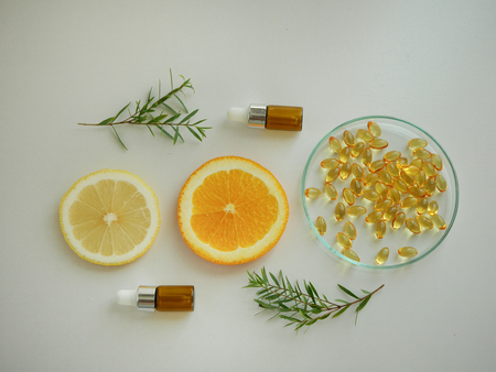 natural cosmetic skincare serum packaging with leaf, home made oil and beauty vitamin ingredient.organic product research the blank bottle container ,bio science . alternative medicine. spa.の写真素材