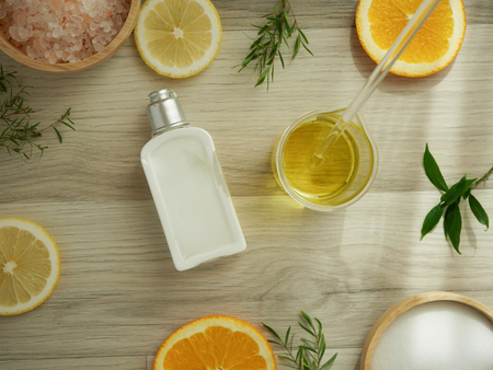 natural cosmetic skincare serum packaging with leaf, home made oil and beauty vitamin ingredient.organic product research the blank bottle container ,bio science . alternative medicine. spa.の写真素材