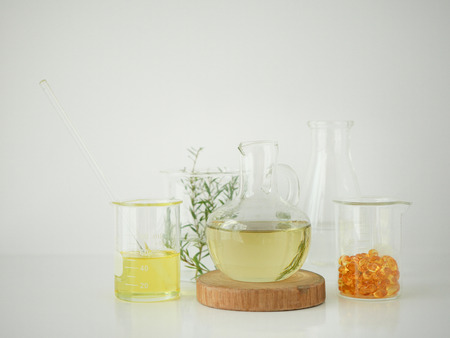 natural cosmetic skincare serum packaging with leaf, home made oil and beauty vitamin ingredient.organic product research the blank bottle container ,bio science . alternative medicine. spa.の写真素材