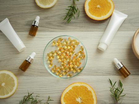 natural cosmetic skincare serum packaging with leaf, home made oil and beauty vitamin ingredient.organic product research the blank bottle container ,bio science . alternative medicine. spa.の写真素材