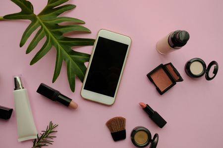 natural cosmetic makeup , organic skincare serum product packaging with leaves herb on nature beauty concept, herb bio and spa concept.pink background.の写真素材