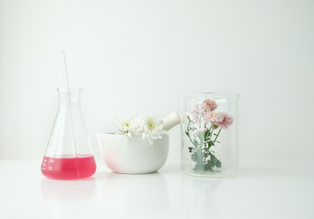 cosmetic skincare beauty product .natural organic flower oil ingredient in the laboratory. packaging spa concept.の写真素材