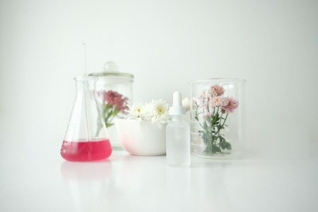 cosmetic skincare beauty product .natural organic flower oil ingredient in the laboratory. packaging spa concept.の写真素材