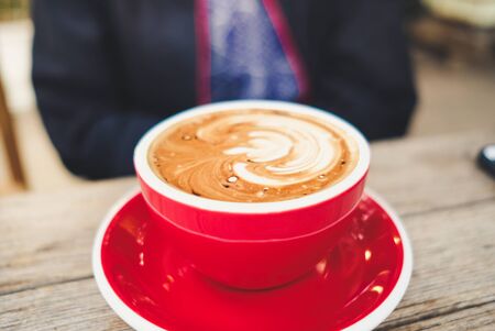 Closeup coffee cups in a cafeの写真素材