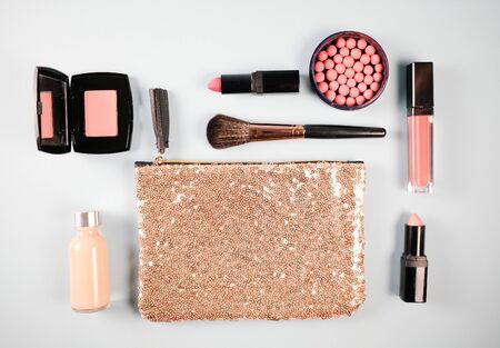 Beauty background for makeup cosmetic product on pastel light blue desktop background. top view, flat lay.の写真素材